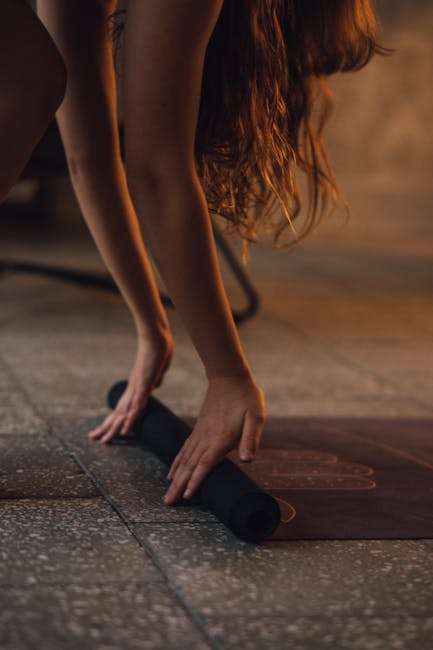 Woman performing a gentle yoga stretch in a peaceful setting